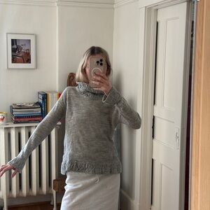 Grey alpaca sweater with cool ruffle detail